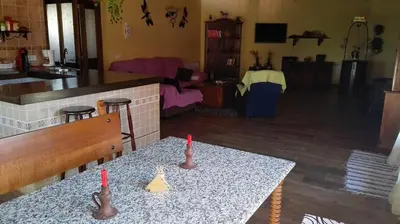 Una televisión o centro de entretenimiento en Casa Rural Rosa Magica