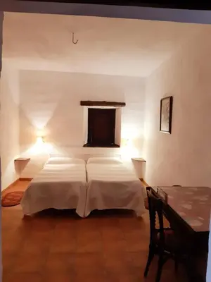 Cama o camas de una habitación en El Aleznal
