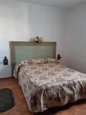 Cama o camas de una habitación en El Aleznal