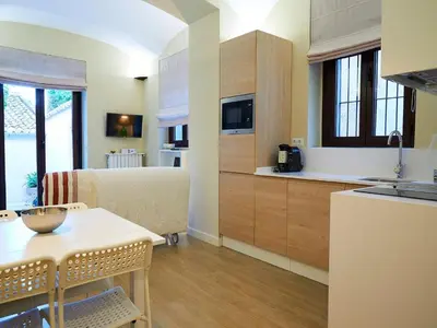 Una cocina o zona de cocina en Apartamentos San Pablo