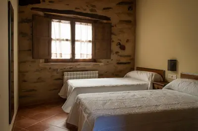Cama o camas de una habitación en Molino del Medio