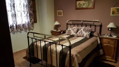 Cama o camas de una habitación en Apartamentos Rurales Tauro