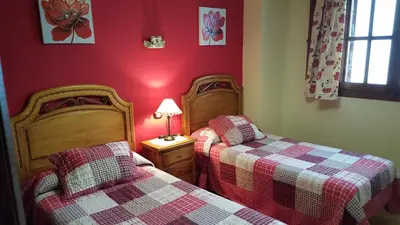 Cama o camas de una habitación en Apartamentos Rurales Tauro