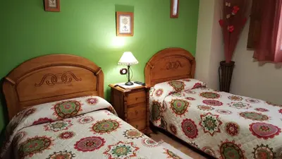 Cama o camas de una habitación en Apartamentos Rurales Tauro