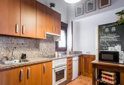 Una cocina o zona de cocina en El Aserradero
