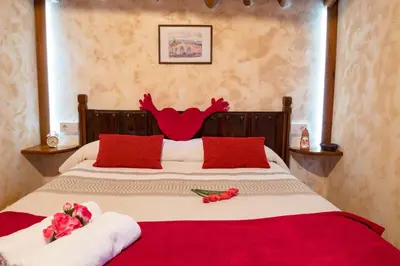 Cama o camas de una habitación en Casa Rural El Berrueco