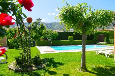 Piscina en o cerca de Casa Rural El Berrueco
