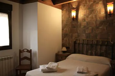 Cama o camas de una habitación en El Teñao
