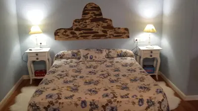 Cama o camas de una habitación en Posada de Los Aceiteros
