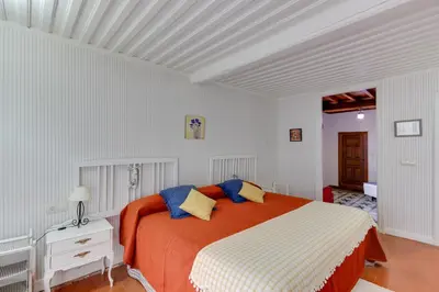 Cama o camas de una habitación en Posada de Los Aceiteros
