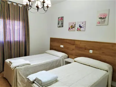 Cama o camas de una habitación en Apartamento Villa Soterraña