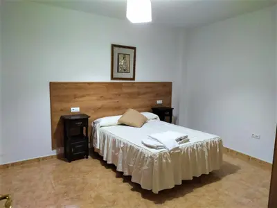 Cama o camas de una habitación en Apartamento Villa Soterraña