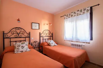 Cama o camas de una habitación en El Leñador I