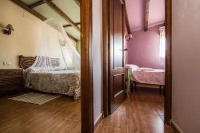 Cama o camas de una habitación en El Leñador I