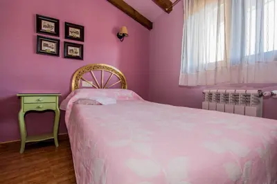 Cama o camas de una habitación en El Leñador I