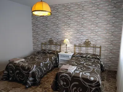 Cama o camas de una habitación en CASA TIO PEGUERO - PISCINA SPA
