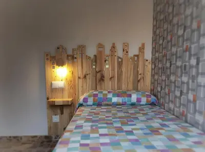 Cama o camas de una habitación en CASA TIO PEGUERO - PISCINA SPA