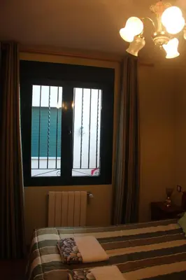 Cama o camas de una habitación en Hostal Maury