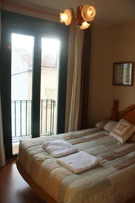 Cama o camas de una habitación en Hostal Maury