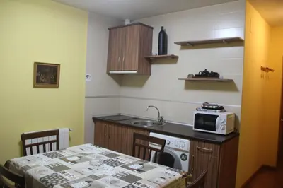 Una cocina o zona de cocina en Hostal Maury