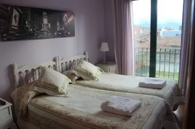 Cama o camas de una habitación en Hostal Maury