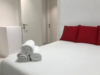 Cama o camas de una habitación en Smart-Tech Plaza Apartment