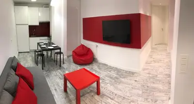Una televisión o centro de entretenimiento en Smart-Tech Plaza Apartment