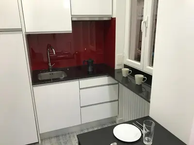 Una cocina o zona de cocina en Smart-Tech Plaza Apartment