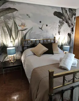 Cama o camas de una habitación en Apartamento Plaza Mayor Trujillo