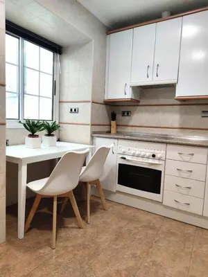 Una cocina o zona de cocina en Apartamento Plaza Mayor Trujillo