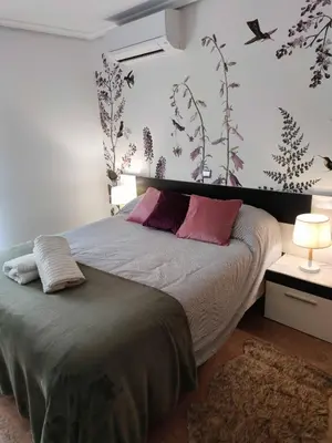 Cama o camas de una habitación en Apartamento Plaza Mayor Trujillo