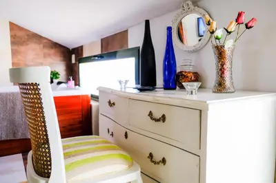 Una cocina o zona de cocina en Atico Romántico