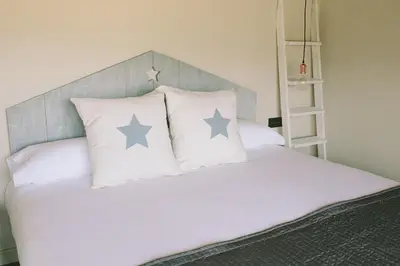 Cama o camas de una habitación en ALTAIR Turismo Rural
