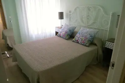 Cama o camas de una habitación en Viv. Turística Museo del Comercio
