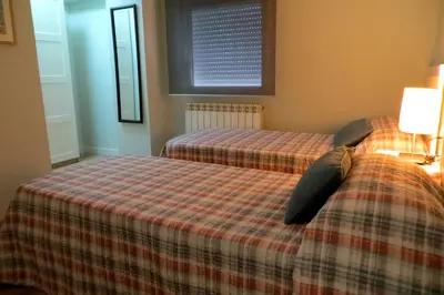 Cama o camas de una habitación en Viv. Turística Museo del Comercio