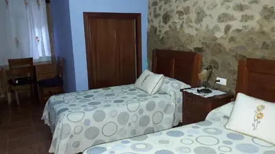 Cama o camas de una habitación en Apartamentos Alejandra