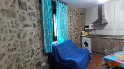 Una cocina o zona de cocina en Apartamentos Alejandra