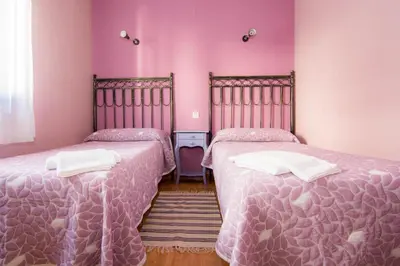 Cama o camas de una habitación en El Leñador II