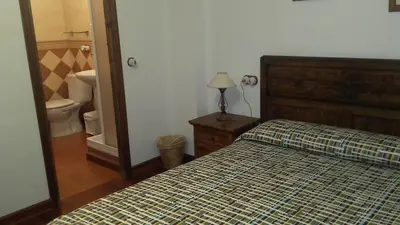 Cama o camas de una habitación en La Posá CR CC 221