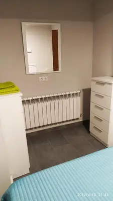 Cama o camas de una habitación en Apartamentos La Plazuela Baños de Montemayor