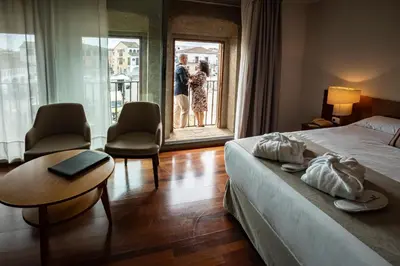 Cama o camas de una habitación en Hotel Puente de Alconétar