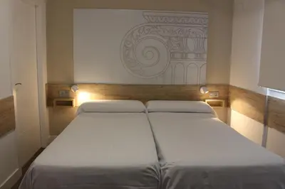 Cama o camas de una habitación en Deluxe Hostels & Suites Merida