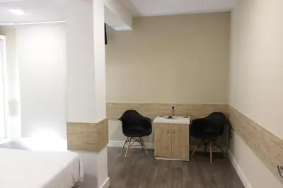 Zona de estar de Deluxe Hostels & Suites Merida