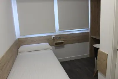 Cama o camas de una habitación en Deluxe Hostels & Suites Merida