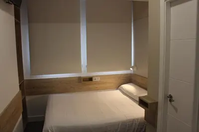 Cama o camas de una habitación en Deluxe Hostels & Suites Merida