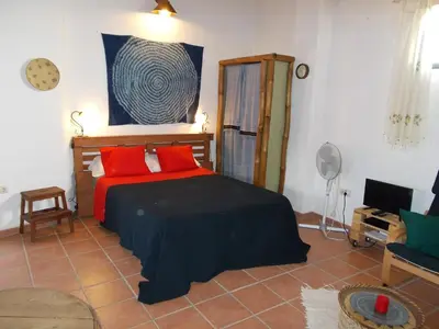 Cama o camas de una habitación en La Tierra Verde STUDIO