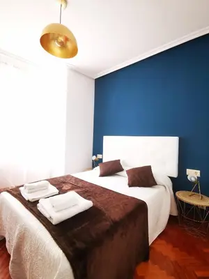 Cama o camas de una habitación en Apartamentos Gran Via