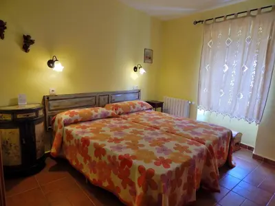 Cama o camas de una habitación en Casa Rural La Perra Gorda