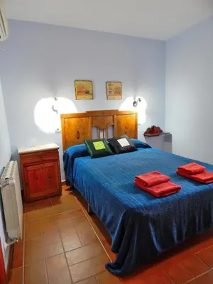 Cama o camas de una habitación en Casa Rural La Perra Gorda
