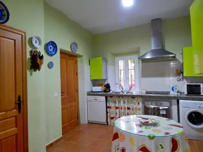 Una cocina o zona de cocina en Casa Rural La Perra Gorda
